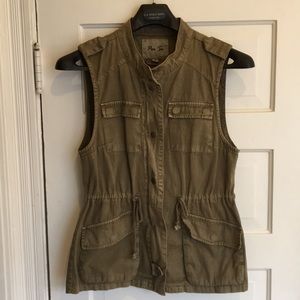 Light, olive green vest